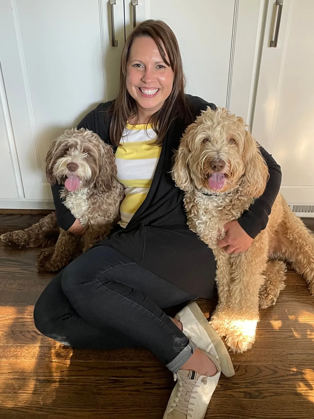 Jennifer with Fozzie, a Blessed Day Doodles guardian-home parent dog